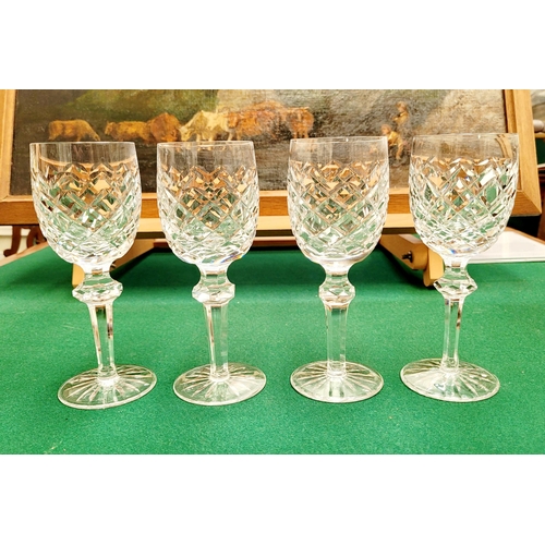 116 - A SET OF FOUR WATERFORD CRYSTAL POWERSCOURT CLARET / WINE GLASSES, each with the maker’s name to the... 