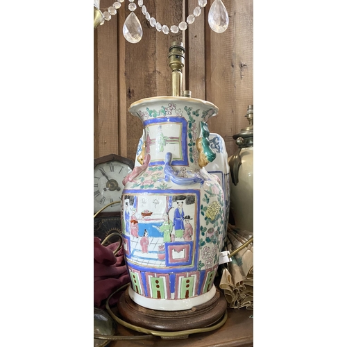 122 - A CHINESE CANTON TABLE LAMP, Chinese vase converted lamp, highly decorated with painted panels depic... 