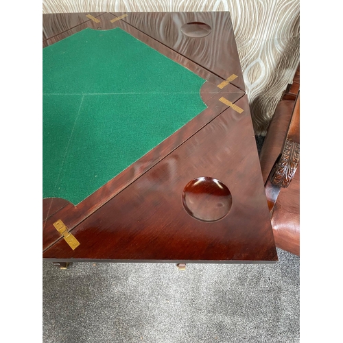 142 - AN EDWARDIAN MAHOGANY INLAID FOLD OUT ENVELOPE CARD TABLE / GAMES TABLE, the top which twists and fo... 