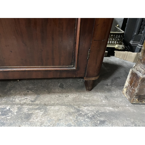 150 - A VICTORIAN MAHOGANY SECRETAIRE, with cornice above arched glass panelled doors, opening to shelved ... 