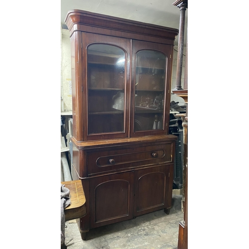 150 - A VICTORIAN MAHOGANY SECRETAIRE, with cornice above arched glass panelled doors, opening to shelved ... 