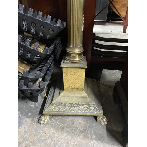 153 - A FINE BRASS FLOOR STANDARD LAMP, Corinthian column form, standing on square base on lions paw feet.... 