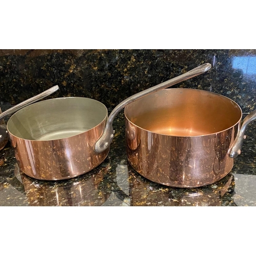 161 - A VERY GOOD SET OF FIVE FRENCH COPPER SAUCEPANS with wrought iron handles, impressed with maker's na... 