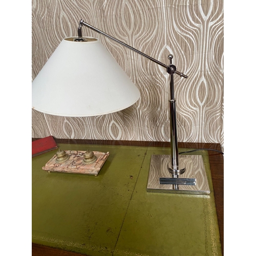 162 - AN ADJUSTABLE CHROME TABLE LAMP / DESK LAMP, with shade.