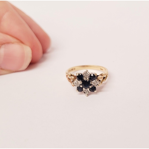 164 - A VERY PRETTY 9CT YELLOW GOLD SAPPHIRE & DIAMOND FLOWER RING, the petals in blue sapphires & small d... 