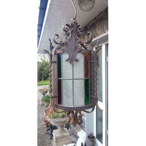 166 - A VERY GOOD QUALITY EARLY 20TH CENTURY WROUGHT IRON LEADED STAIN GLASS HALL LANTERN / OUTDOOR LANTER... 