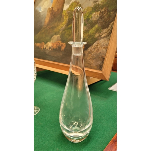 173 - A VERY GOOD EARLY 20TH CENTURY VICKE LINDSTRAND FOR ORREFORS BLOWN GLASS DECANTER, with stopped, etc... 