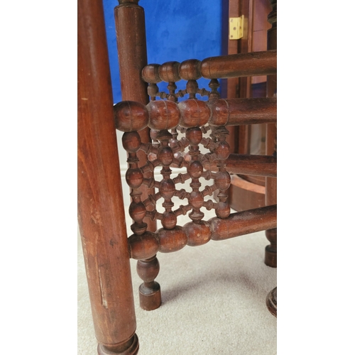 178 - AN INDIAN BRASS TRAY TABLE with folding turned wooden base, nice decorative antique piece, the tray ... 