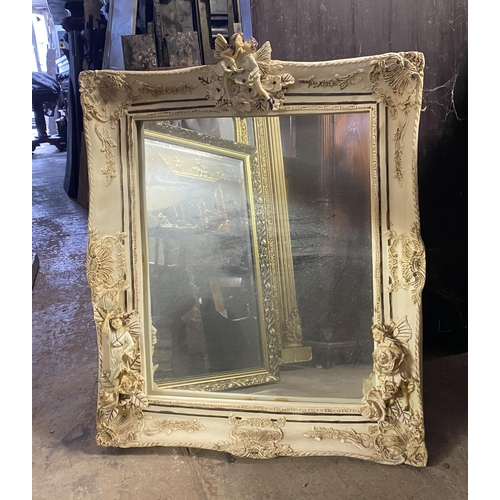 181 - A RECTANGULAR ALABASTER MIRROR, finely decorated with floral scrolling decoration as well as cherubs... 