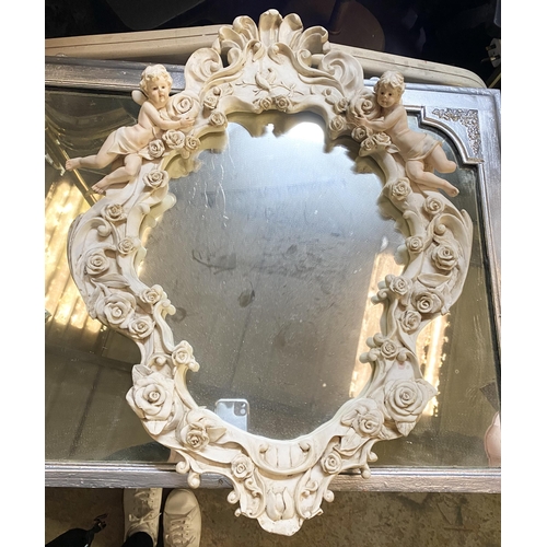 182 - A BEAUTIFUL ALABASTER CHERUB WALL MIRROR, crest form with floral rose decoration throughout, scroll ... 