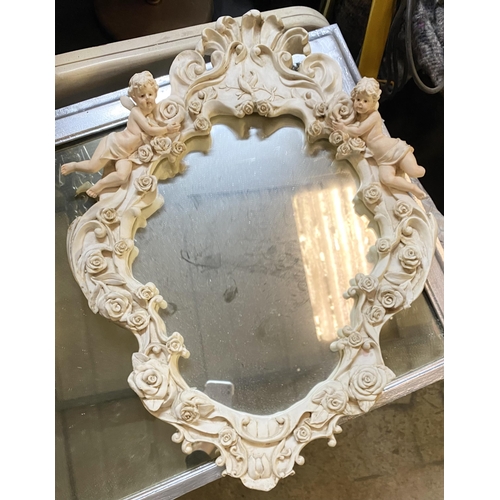 182 - A BEAUTIFUL ALABASTER CHERUB WALL MIRROR, crest form with floral rose decoration throughout, scroll ... 