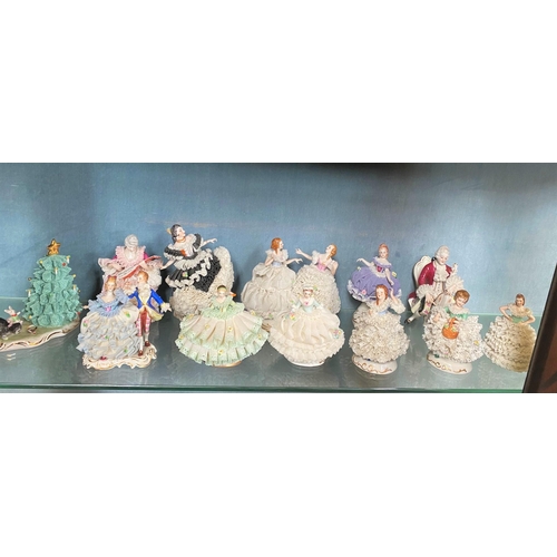 191 - A COLLECTION OF IRISH DRESDEN FIGURINES – 12 pieces included in this lot. Beautiful delicate crafted... 