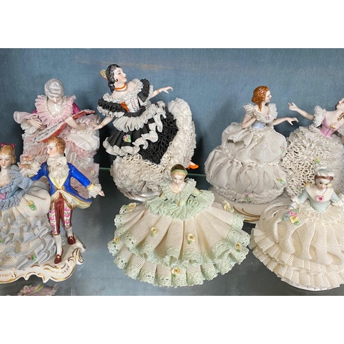 191 - A COLLECTION OF IRISH DRESDEN FIGURINES – 12 pieces included in this lot. Beautiful delicate crafted... 