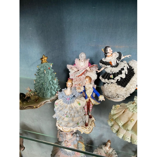 191 - A COLLECTION OF IRISH DRESDEN FIGURINES – 12 pieces included in this lot. Beautiful delicate crafted... 