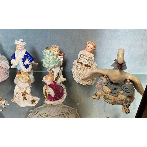 192 - A COLLECTION OF IRISH DRESDEN FIGURINES – 11 pieces included in this lot. Beautiful delicate crafted... 