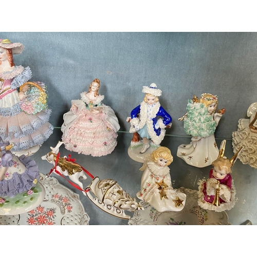 192 - A COLLECTION OF IRISH DRESDEN FIGURINES – 11 pieces included in this lot. Beautiful delicate crafted... 