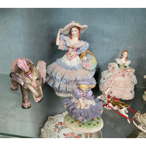 192 - A COLLECTION OF IRISH DRESDEN FIGURINES – 11 pieces included in this lot. Beautiful delicate crafted... 