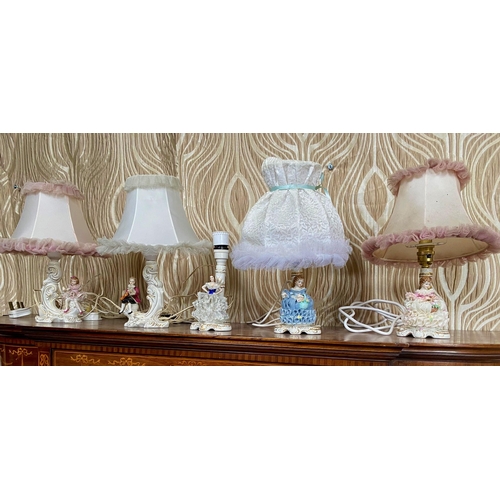 194 - A SET OF FIVE DRESDEN TABLE LAMPS, includes two pairs & one single lamp. All with makers mark to the... 