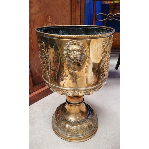 2 - A LARGE 19TH CENTURY BRASS PLANTER ‘CACHÉPOT’ decorated to the body with a crest on each side & a pa... 