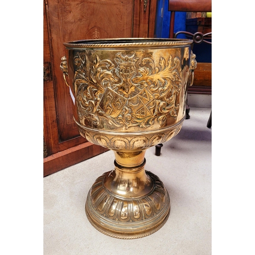 2 - A LARGE 19TH CENTURY BRASS PLANTER ‘CACHÉPOT’ decorated to the body with a crest on each side & a pa... 