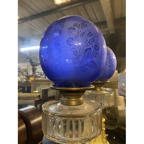 20 - A VERY GOOD QUALITY VICTORIAN ‘HINKS DUPLEX PATENT’ OIL LAMP, with double burner, the blue globe sha... 