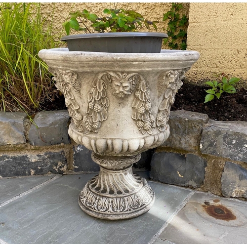 200 - A PAIR OF VERY GOOD QUALITY STONE GARDEN PLANTER URNS, with foliage, fruit & faun like head motif to... 