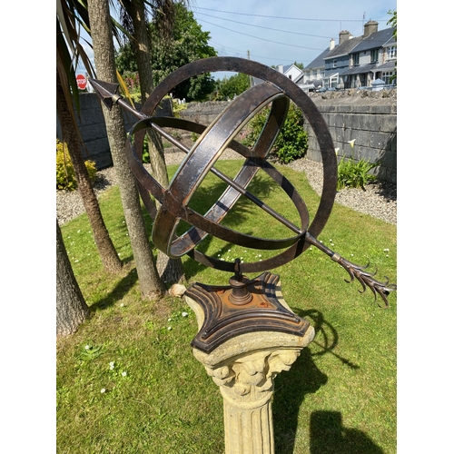 207 - A VERY GOOD QUALITY GARDEN ORNAMENT IN THE FORM OF AN ARMILLARY SUN DIAL PLACED UPON A STONE COLUMN ... 