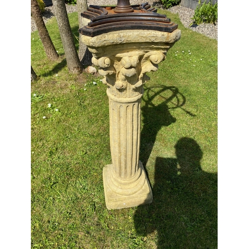 207 - A VERY GOOD QUALITY GARDEN ORNAMENT IN THE FORM OF AN ARMILLARY SUN DIAL PLACED UPON A STONE COLUMN ... 