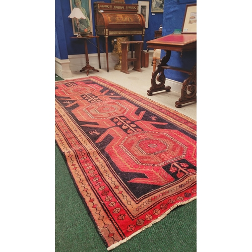 211 - A GOOD VINTAGE ARDEBIL IRANIAN WOVEN FLOOR RUG / WIDE RUNNER, with short white fringe to the ends, t... 