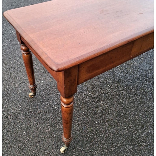 38 - A FINE VICTORIAN MAHOGANY SOFA TABLE / DESK, with rounded corners to the rectangular shaped top, a s... 