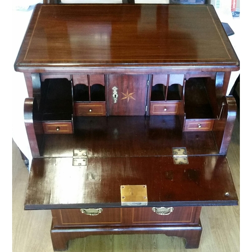 4 - A VERY FINE GEORGE II NEATLY SIZED WALNUT FALL FRONT SECRETAIRE CHEST, from the string inlaid top to... 