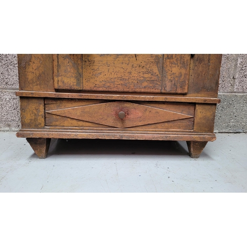 42 - A VERY CHAMING COUNTRY-STYLE / RUSTIC SINGLE DOOR CABINET, with a triangular pediment to the front, ... 