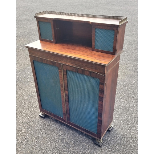 43 - A 19TH CENTURY ROSEWOOD TWO DOOR CHIFFONERE CABINET, with a top gallery section housing a pair of ca... 