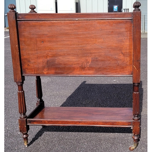 49 - A LATE 19TH / EARLY 20TH CENTURY MAHOGANY THREE TIER SIDE BOARD/OPEN CABINET, the tip of each of the... 