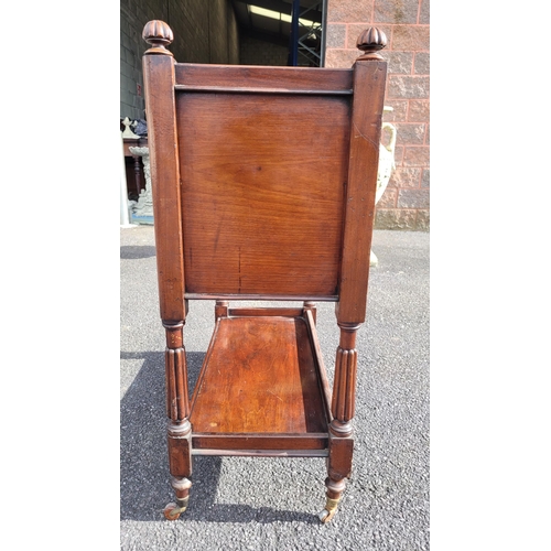 49 - A LATE 19TH / EARLY 20TH CENTURY MAHOGANY THREE TIER SIDE BOARD/OPEN CABINET, the tip of each of the... 