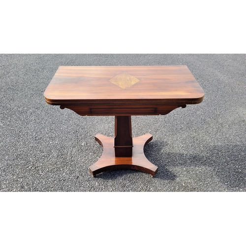 53 - A VERY FINE 19TH CENTURY FOLD OVER MAHOGANY TEA TABLE, with rounded corners to the inlaid table top ... 