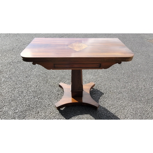 53 - A VERY FINE 19TH CENTURY FOLD OVER MAHOGANY TEA TABLE, with rounded corners to the inlaid table top ... 