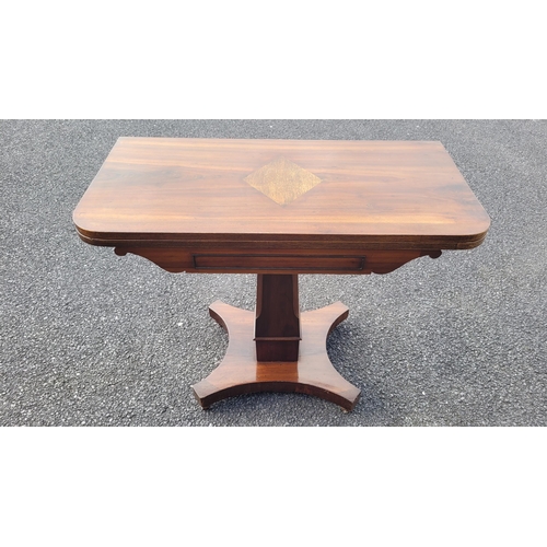 53 - A VERY FINE 19TH CENTURY FOLD OVER MAHOGANY TEA TABLE, with rounded corners to the inlaid table top ... 