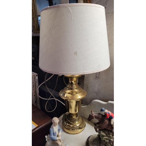 54 - A PAIR OF BALUSTER SHAPED BRASS STYLE TABLE LAMPS, each with a shade, 68cm tall with shade, 48cm tal... 