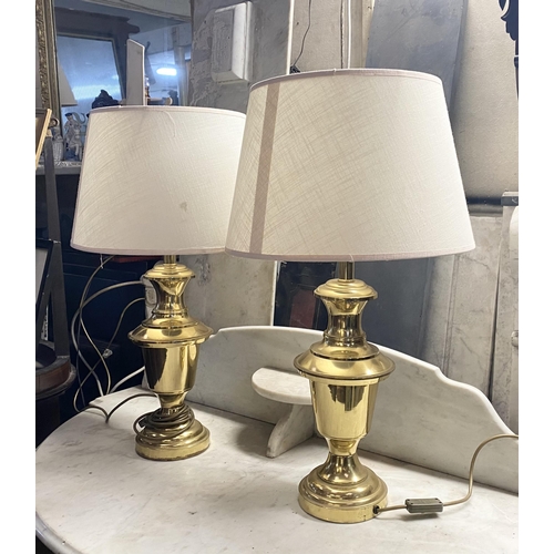 54 - A PAIR OF BALUSTER SHAPED BRASS STYLE TABLE LAMPS, each with a shade, 68cm tall with shade, 48cm tal... 