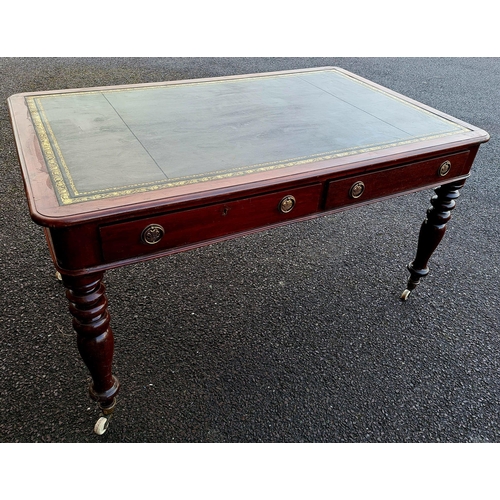 55 - A VERY GOOD QUALITY 19TH CENTURY MAHOGANY TOOLED LEATHER TOPPED WRITING DESK, the desk top with roun... 