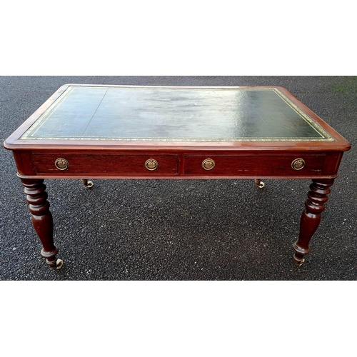 55 - A VERY GOOD QUALITY 19TH CENTURY MAHOGANY TOOLED LEATHER TOPPED WRITING DESK, the desk top with roun... 