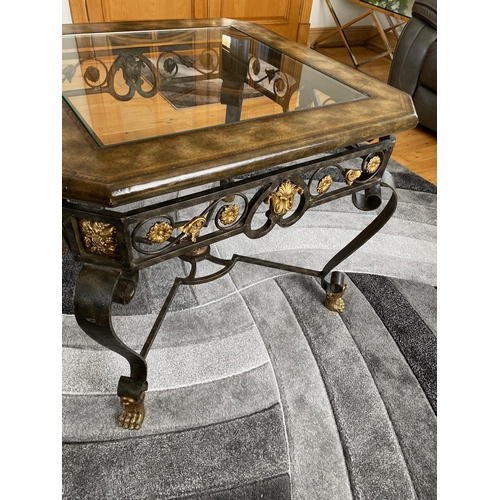 69 - A VERY GOOD QUALITY GLASS TOPPED COFFEE TABLE, the top with canted corners and a leather inset detai... 