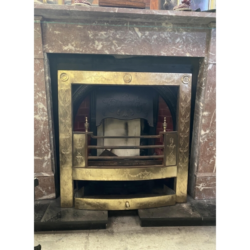 70 - AN EXCELLENT POLISHED BRASS FIRE INSERT, with decorative bow and swag designs throughout, finials to... 