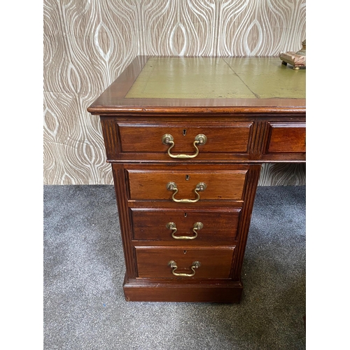 74 - AN EARLY 20TH CENTURY VERY GOOD QUALITY MAHOGANY LEATHER TOPPED PEDESTAL DESK, maker’s label to the ... 