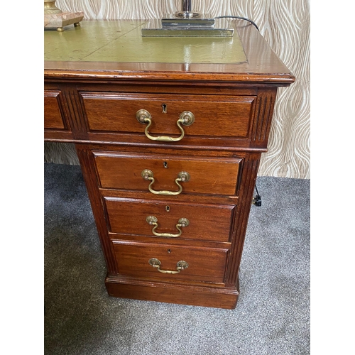 74 - AN EARLY 20TH CENTURY VERY GOOD QUALITY MAHOGANY LEATHER TOPPED PEDESTAL DESK, maker’s label to the ... 