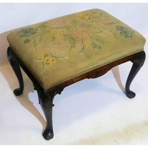 88 - AN IRISH 19TH CENTURY WALNUT STOOL, with stuffed over upholstered seat, raised on a shaped apron wit... 