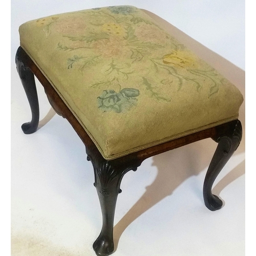 88 - AN IRISH 19TH CENTURY WALNUT STOOL, with stuffed over upholstered seat, raised on a shaped apron wit... 