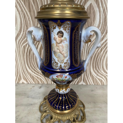 99 - A BEAUTIFUL PAIR OF SEVRES STYLE PORCELAIN & BRASS OIL LAMPS, each with a cobalt blue & gilt coloure... 