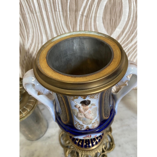 99 - A BEAUTIFUL PAIR OF SEVRES STYLE PORCELAIN & BRASS OIL LAMPS, each with a cobalt blue & gilt coloure... 